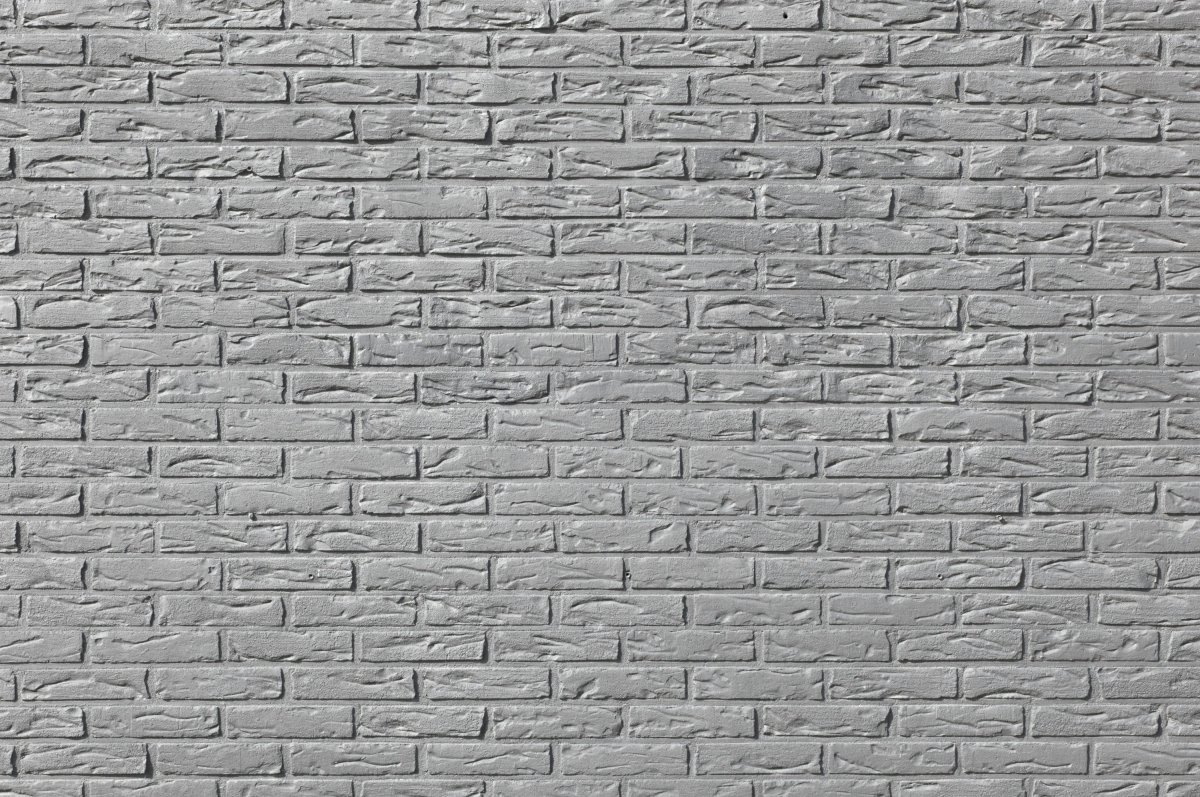 Серая кирпичная стена