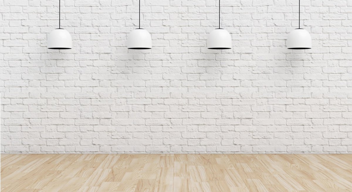 Белая кирпичная стена с полом