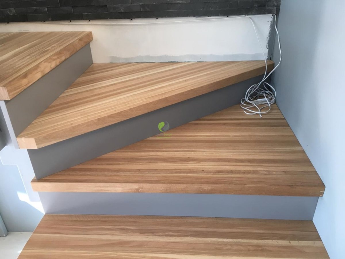 Обделываем ступени лестницы ламинатом