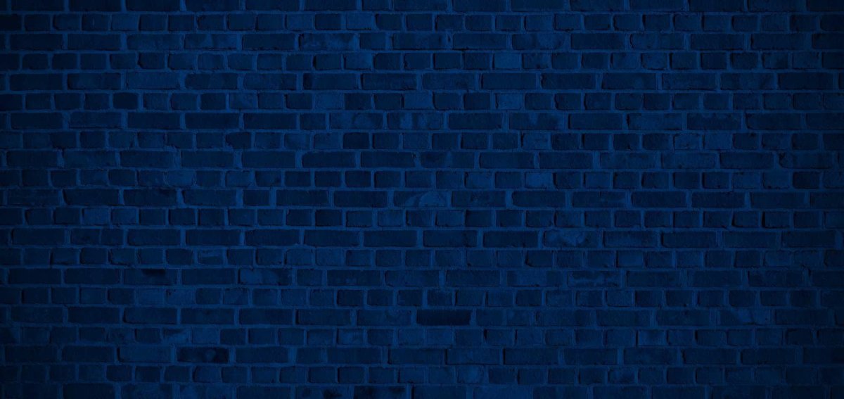 Темно синяя кирпичная стена